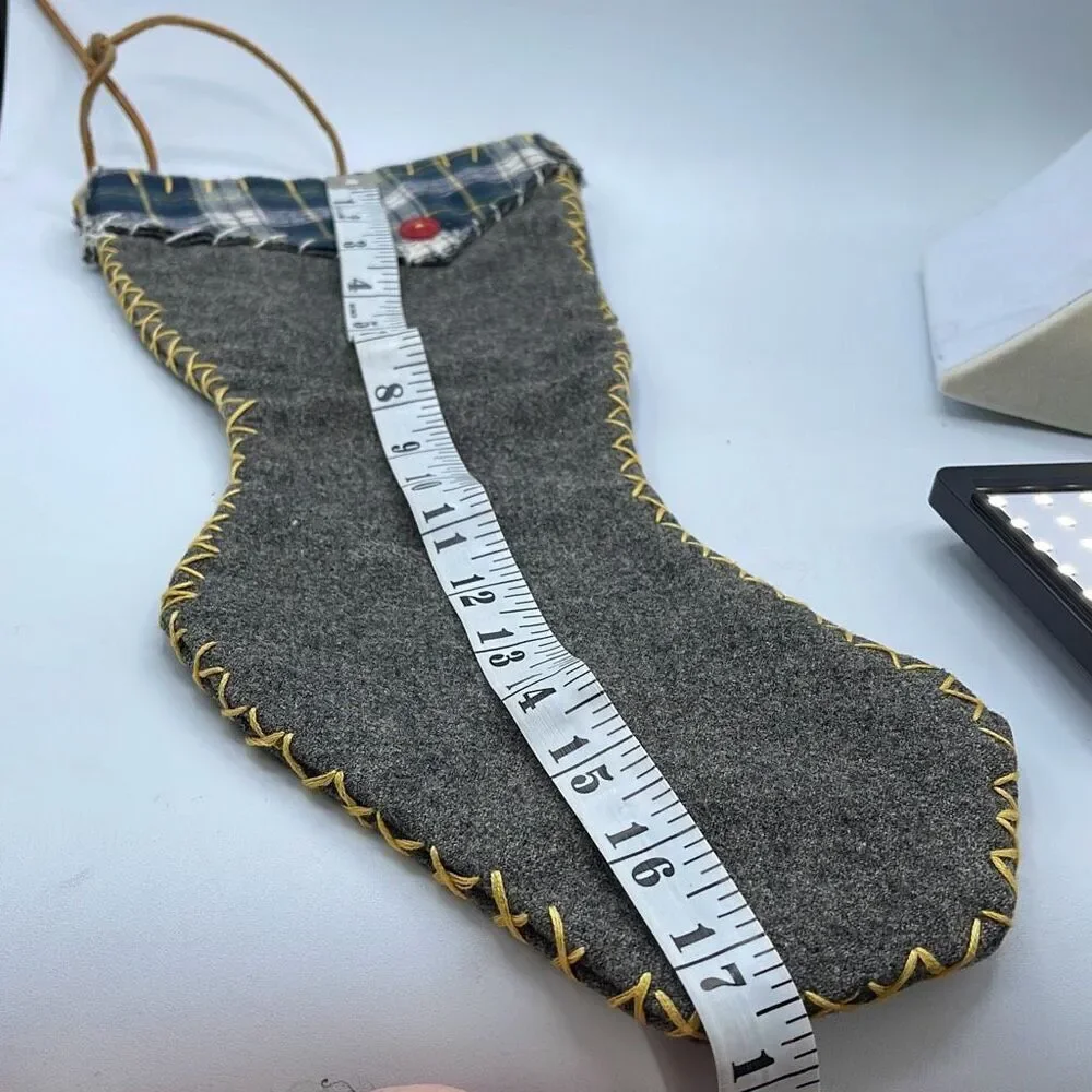 Vintage handmade grey wool Christmas stocking.